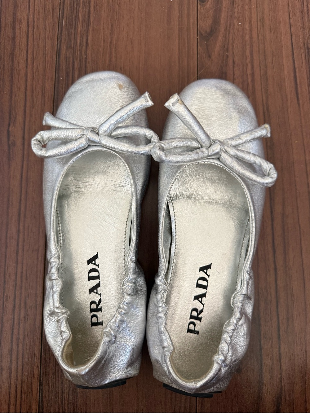 Prada Metallic Silver Bow Flats